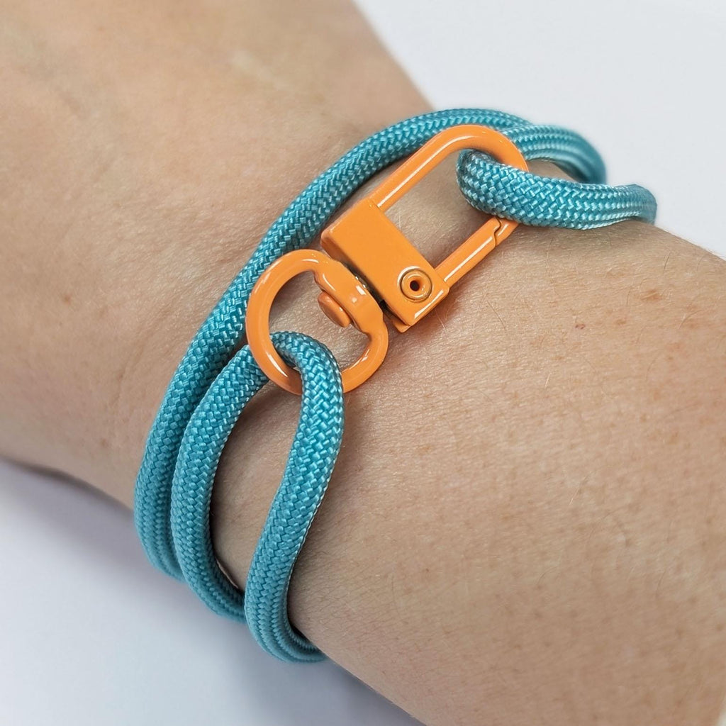 Turquoise Adjustable Paracord Bracelet with Orange Clasp